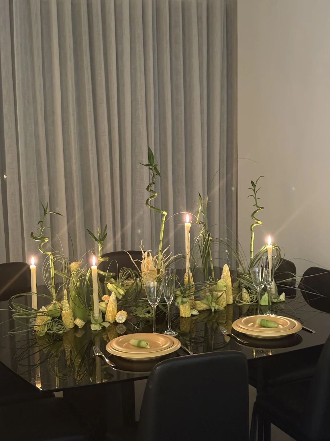 Wide view of complete sculptural corn tablescape